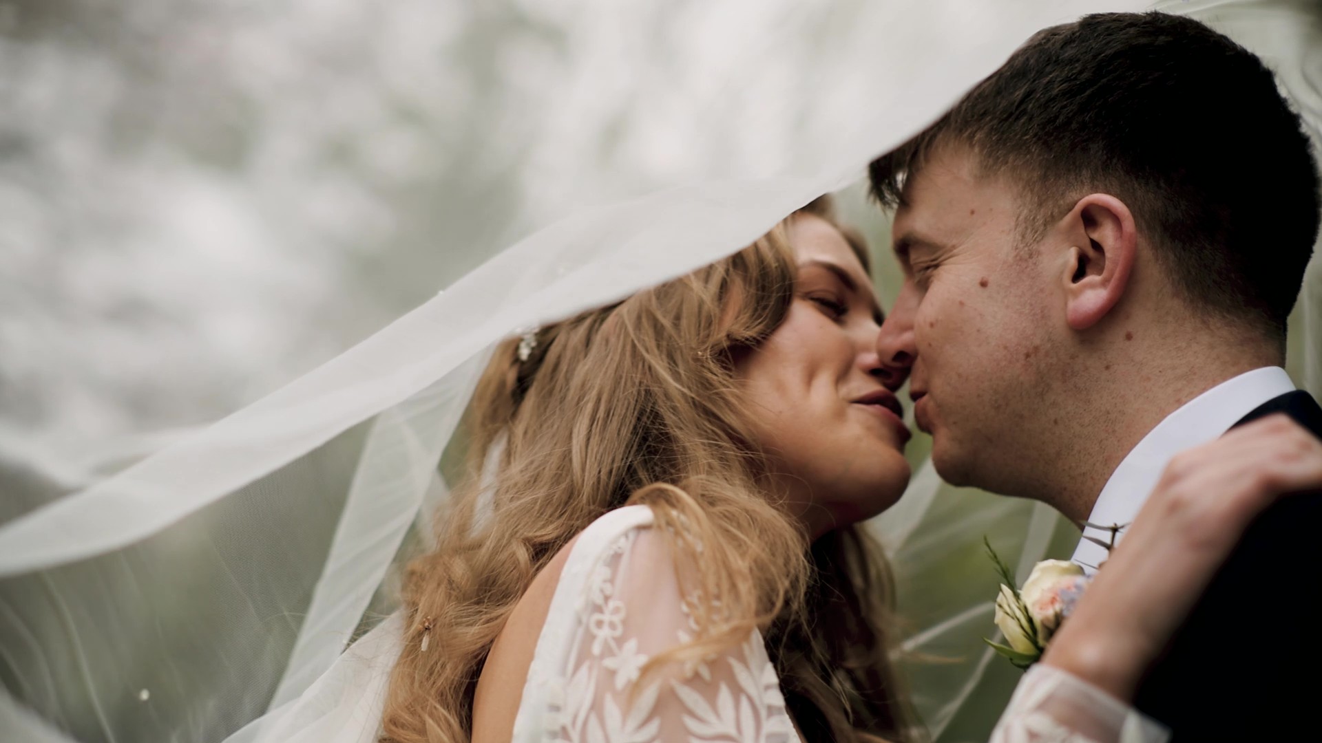 Couple kissing on their wedding day in Somerset
