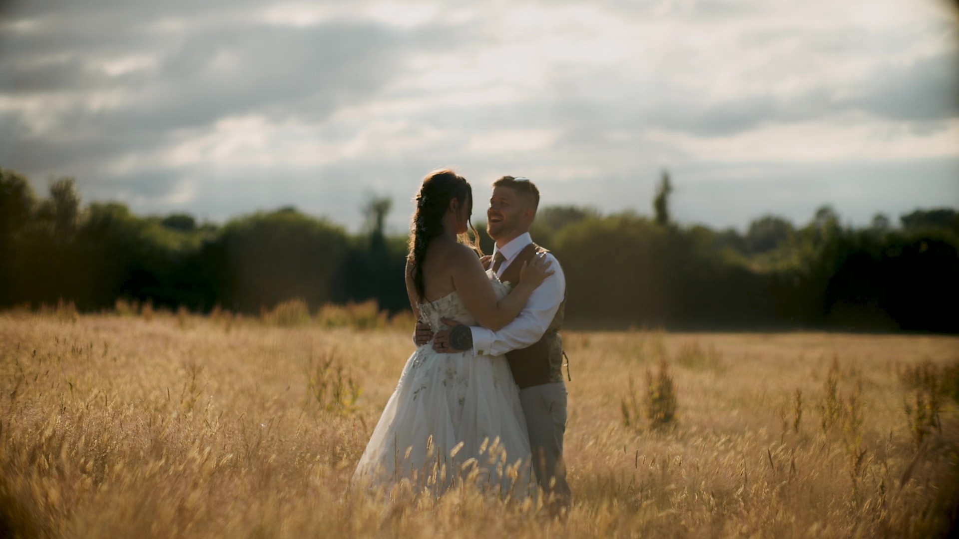Newlyweds holding each other