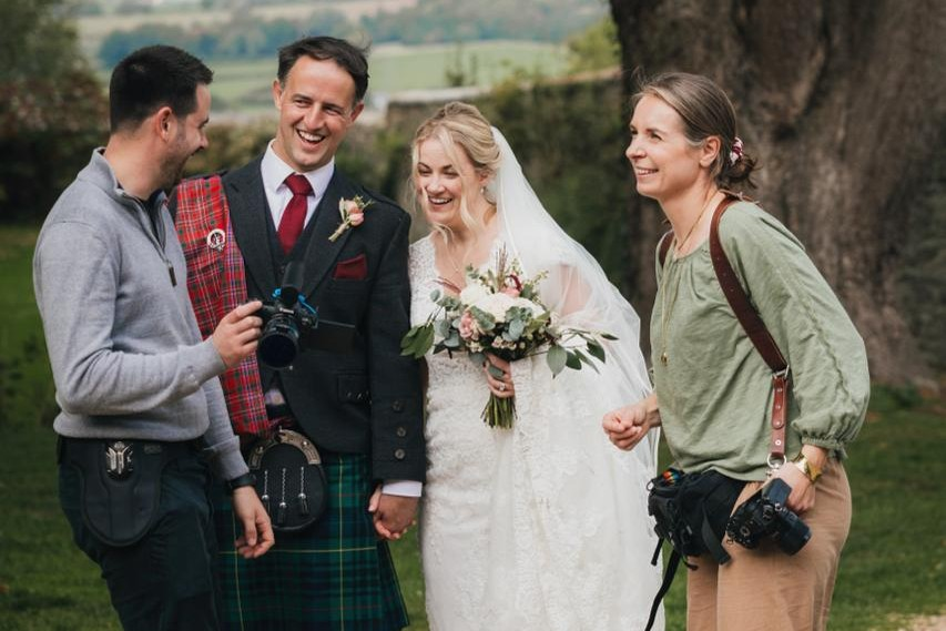 Wedding videographer in Bath coordinating with couple during wedding day