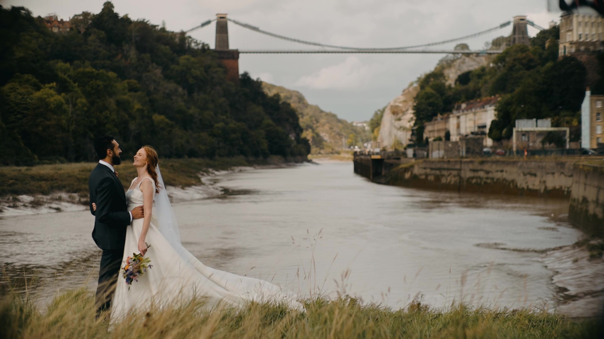 Emotional candid moment from real wedding filmed in Bristol