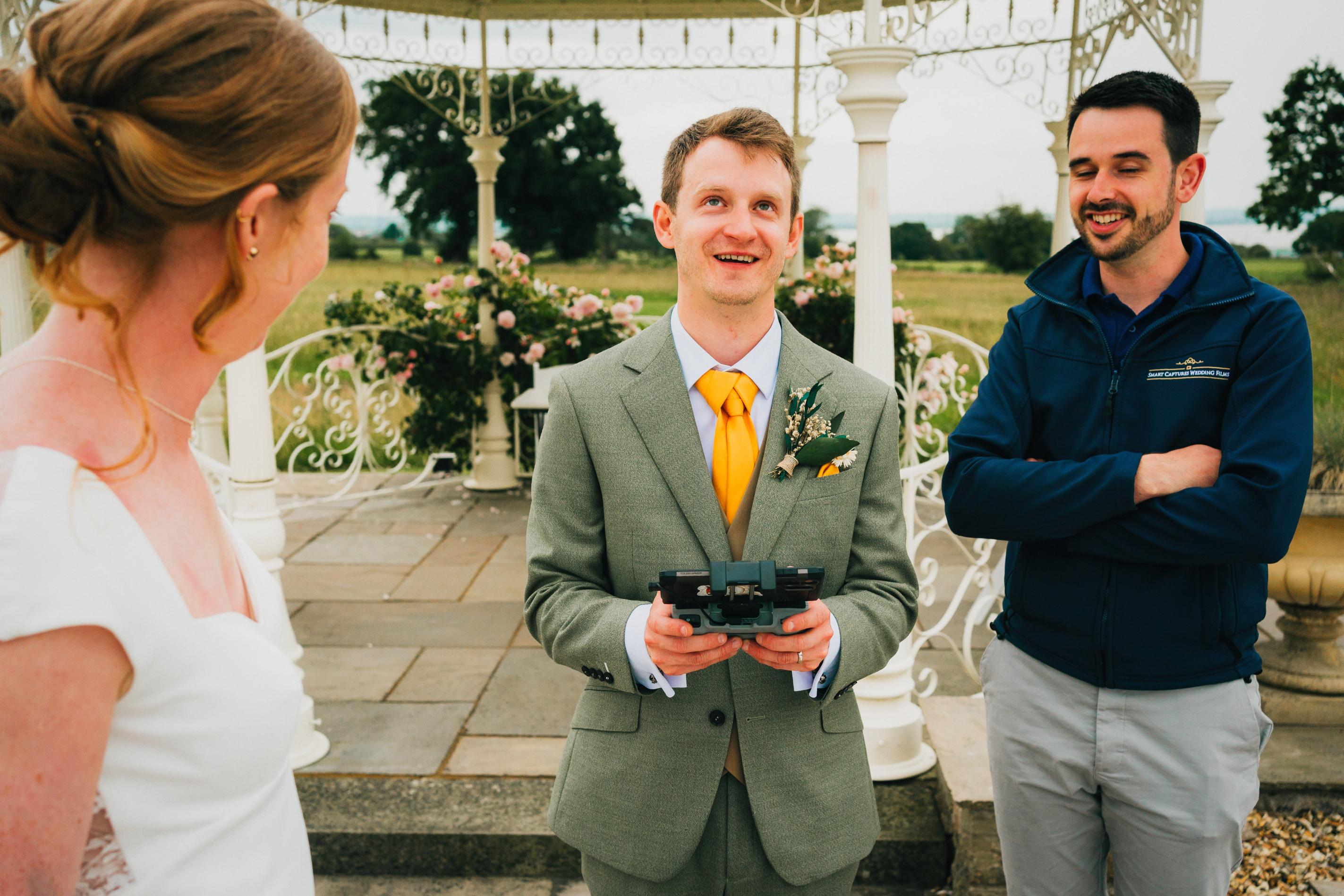 Wedding videographer filming with drone at countryside venue in the UK