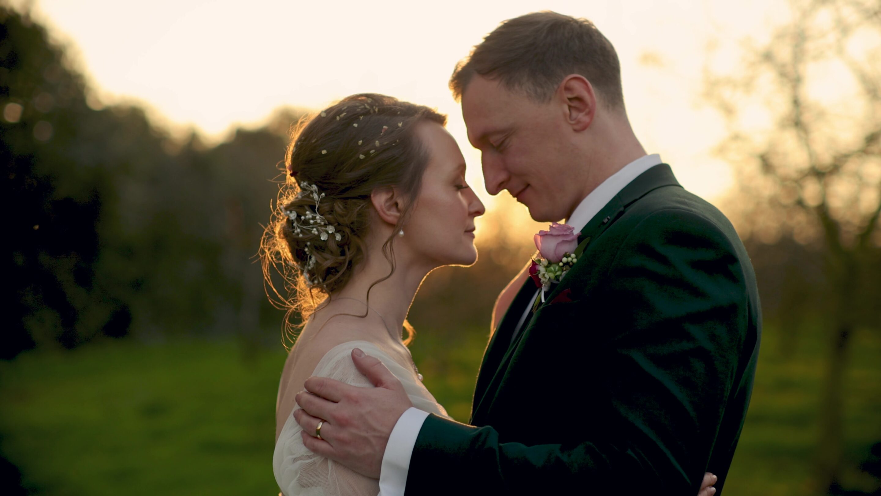 Couple holding each other on their wedding in Devon